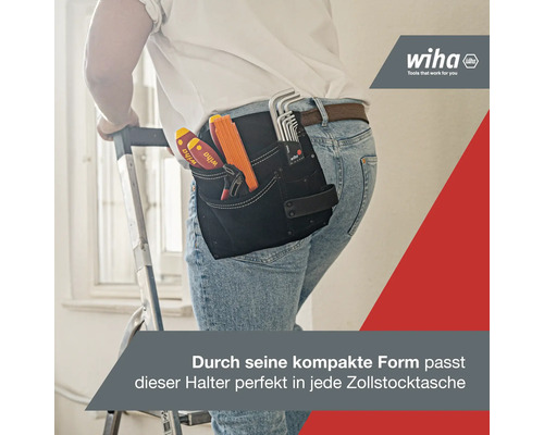 Handwerker mit Werkzeug in Wiha Werkzeugtasche am Gürtel