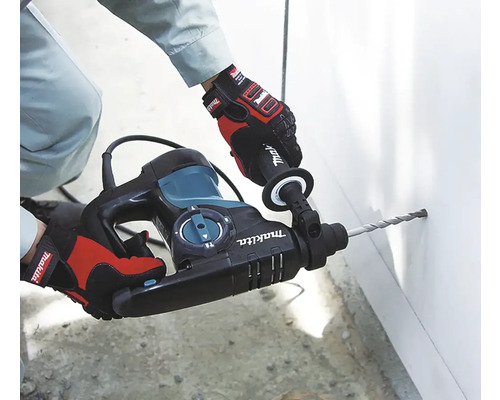 Makita Bohrhammer im Einsatz an einer Wand