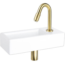 Waschtisch mit goldener Armatur