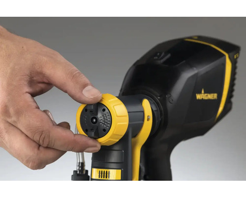 Farbsprühsystem mit einstellbarer Düse in der Hand