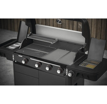 Geöffneter Gasgrill mit vier Brennern und Warmhalterost.