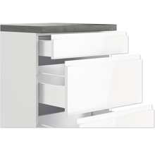 Weißer Unterschrank mit Schubladen und grauer Arbeitsplatte