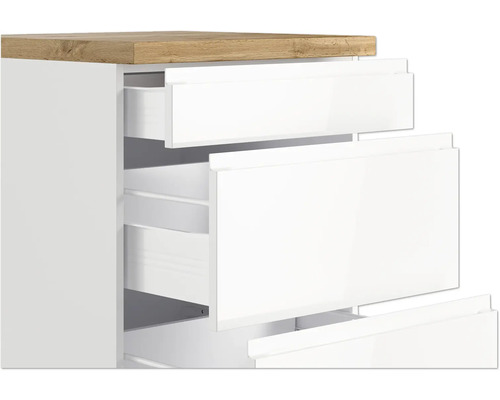 Kommode mit weißen Schubladen und Holzplatte