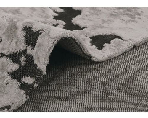 Nahaufnahme eines gemusterten Teppichs