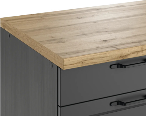 Detailansicht eines Kommodenmöbels mit Schubladen und einer Holzplatte