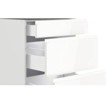 Weißer Schubladenschrank mit offenen Schubladen