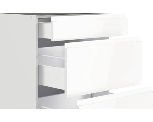 Weißer Schubladenschrank mit offenen Schubladen