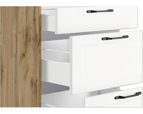 Detailansicht eines Möbelschranks mit offenen Schubladen und Holzdekor an der Seite.