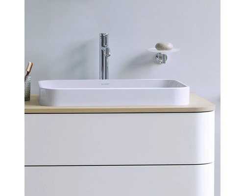 Waschtisch mit Armatur, Seifenschale und Unterschrank für das Badezimmer.