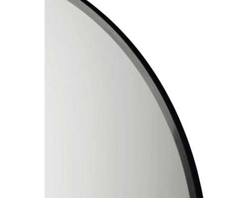 Detailansicht eines runden Spiegels mit dunklem Rahmen