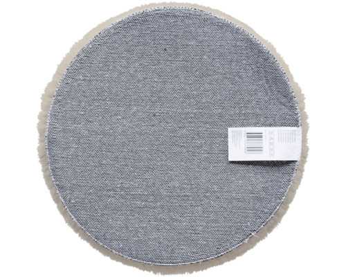 Runde Teppichunterseite mit Etikett