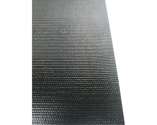 Nahaufnahme einer schwarzen Noppenbahn aus Kunststoff