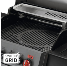 Innenansicht eines Grills mit Warmhalterost und Grillrost