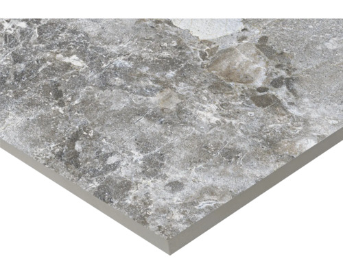 Nahaufnahme einer grauen Bodenfliese mit Marmorstruktur.