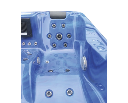 Detailansicht eines Whirlpools mit Düsen und Bedienelementen.