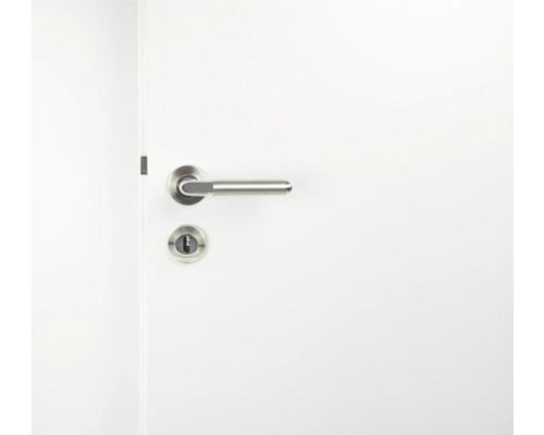 Weiße Tür mit Türgriff und Schloss