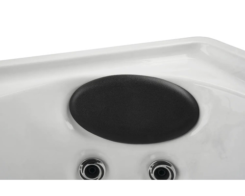 Detailansicht einer Whirlpoolwanne mit Kopfstütze und Düsen