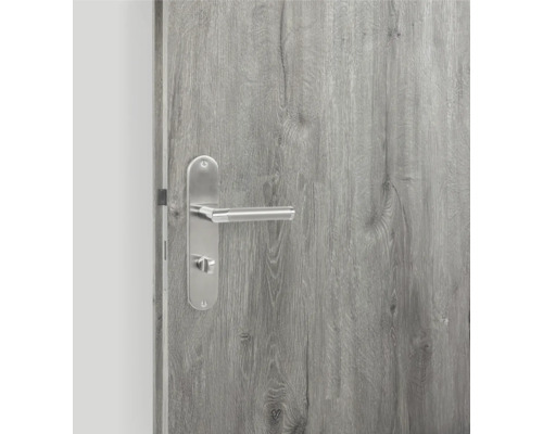 Graue Innentür mit Türgriff