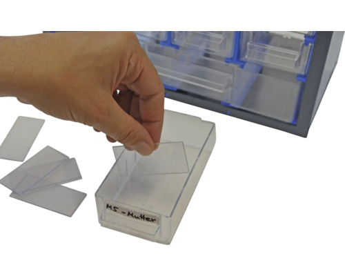 Schubladeneinsatz mit Einteilern und einer Hand