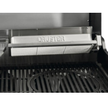 Nahaufnahme des Krustenbrenners und des Grillrosts eines Gasgrills