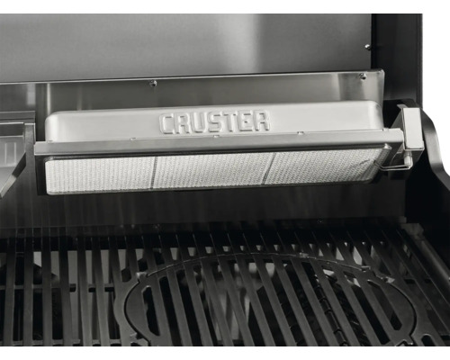 Nahaufnahme des Krustenbrenners und des Grillrosts eines Gasgrills