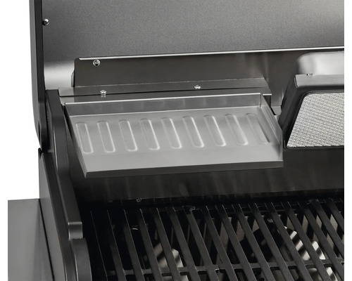 Detailaufnahme eines Grillrosts mit Warmhalterost