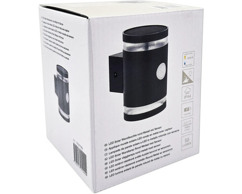 Verpackung einer runden Solar LED Wandleuchte aus Metall mit Sensor