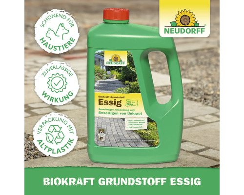 Essig-Unkrautvernichter in grüner Flasche