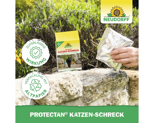 Protectan Katzenschreck Packung und Aluminiumbeutel neben Steinen und Pflanzen