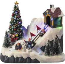 Dekorative Winterlandschaft mit Weihnachtsbaum, Iglu, Haus und Skifahrern