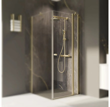 Duschkabine mit Duschsystem und Schwingtür vor dunkler Marmorwand