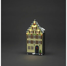 Beleuchtetes Weihnachtshaus als Dekoration