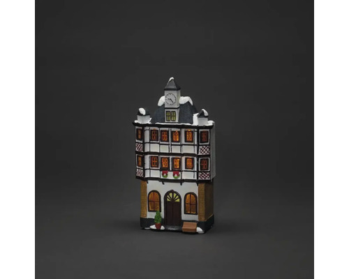 Dekoratives Gebäude mit Uhr für die Weihnachtszeit