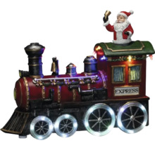 Dekorativer Weihnachtszug mit Santa Claus Figur und Beleuchtung als festliche Dekoration