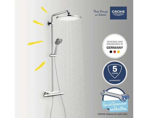 Duschsystem mit Kopf- und Handbrause aus Metall mit Wasserstrahl. Grohe Logo. Hergestellt in Deutschland. Fünf Jahre Garantie. Inklusive Schnellspannern.