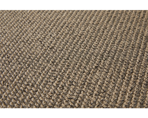 Nahaufnahme eines beigen Teppichs