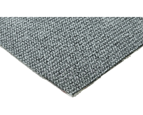 Nahaufnahme eines grauen Teppichbodens.