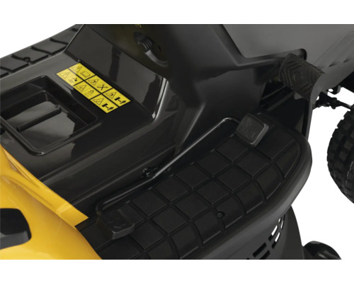 Detailansicht eines Rasentraktors mit Fußpedal und Sicherheitshinweisen