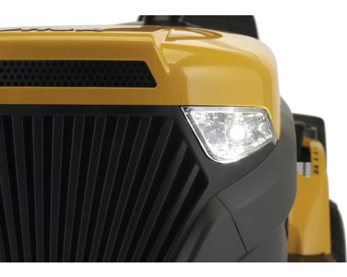 Detailansicht eines Rasentraktors mit Scheinwerfer und Kühlergrill