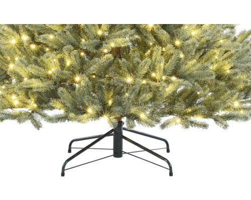 Künstlicher Weihnachtsbaum mit Lichtern und Metallständer