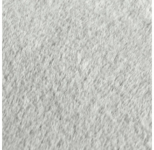Detailaufnahme eines grauen Teppichs