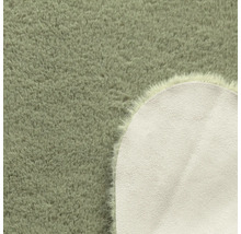 Detailansicht eines runden Teppichs mit Flor