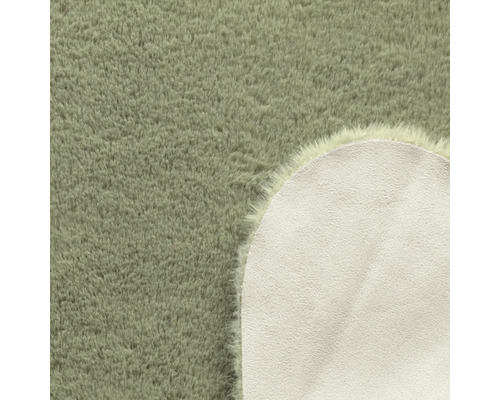 Detailansicht eines runden Teppichs mit Flor