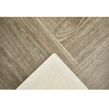 Detailaufnahme eines Vinylbodens in Holzoptik mit Trittschalldämmung