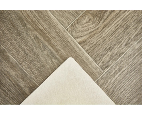 Detailaufnahme eines Vinylbodens in Holzoptik mit Trittschalldämmung