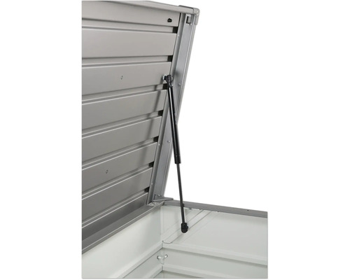 Detailansicht einer geöffneten Gerätebox mit Gasdruckfeder zur Unterstützung des Deckels.