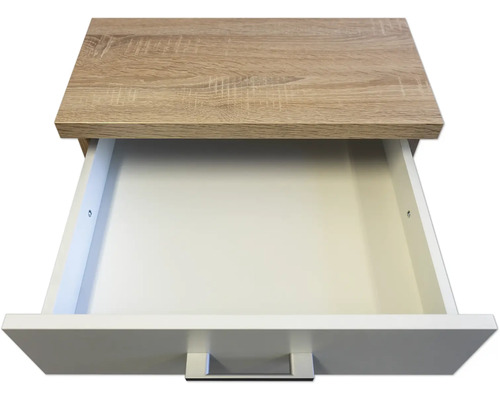 Offene Schublade mit Holzdekor-Oberseite und weißer Front.