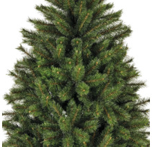 Nahaufnahme eines künstlichen Weihnachtsbaums mit grünen Nadeln.
