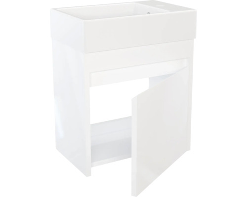 Weißer Waschbeckenunterschrank mit offener Tür