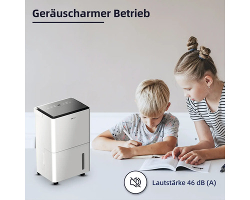 Luftentfeuchter im Betrieb mit Kindern am Tisch